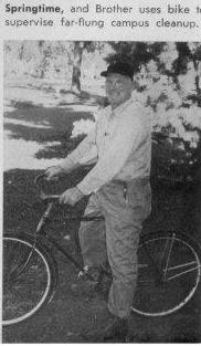 Bro Eakin Inspecting by Bike